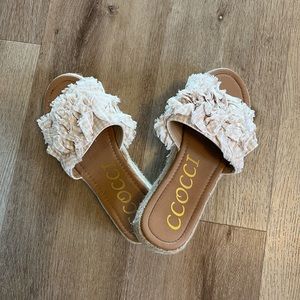 Platform slide-in sandals.